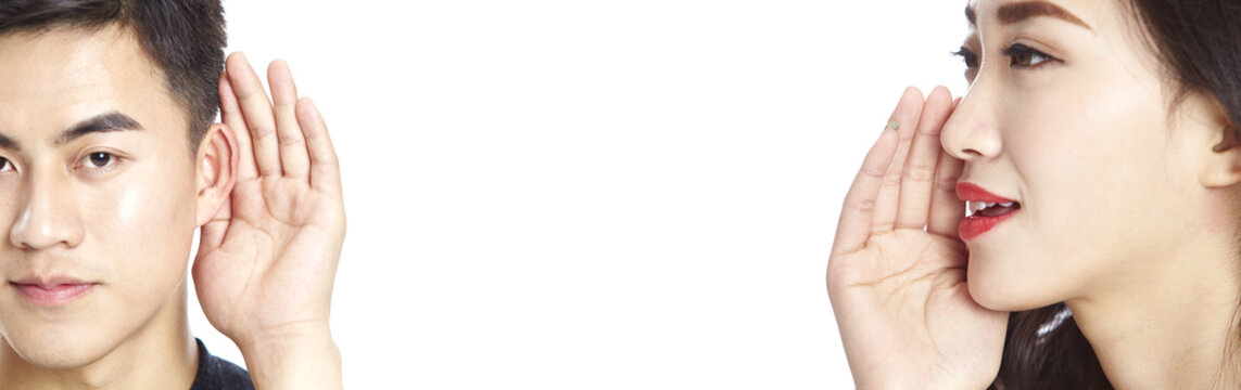 asian woman speaking to asian man