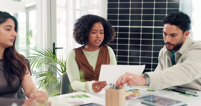 Paperwork, business people or discussion in office meeting, sustainability and solar panel chart. Talk, team and document for clean energy, environmental impact or ESG report with strategy analysis